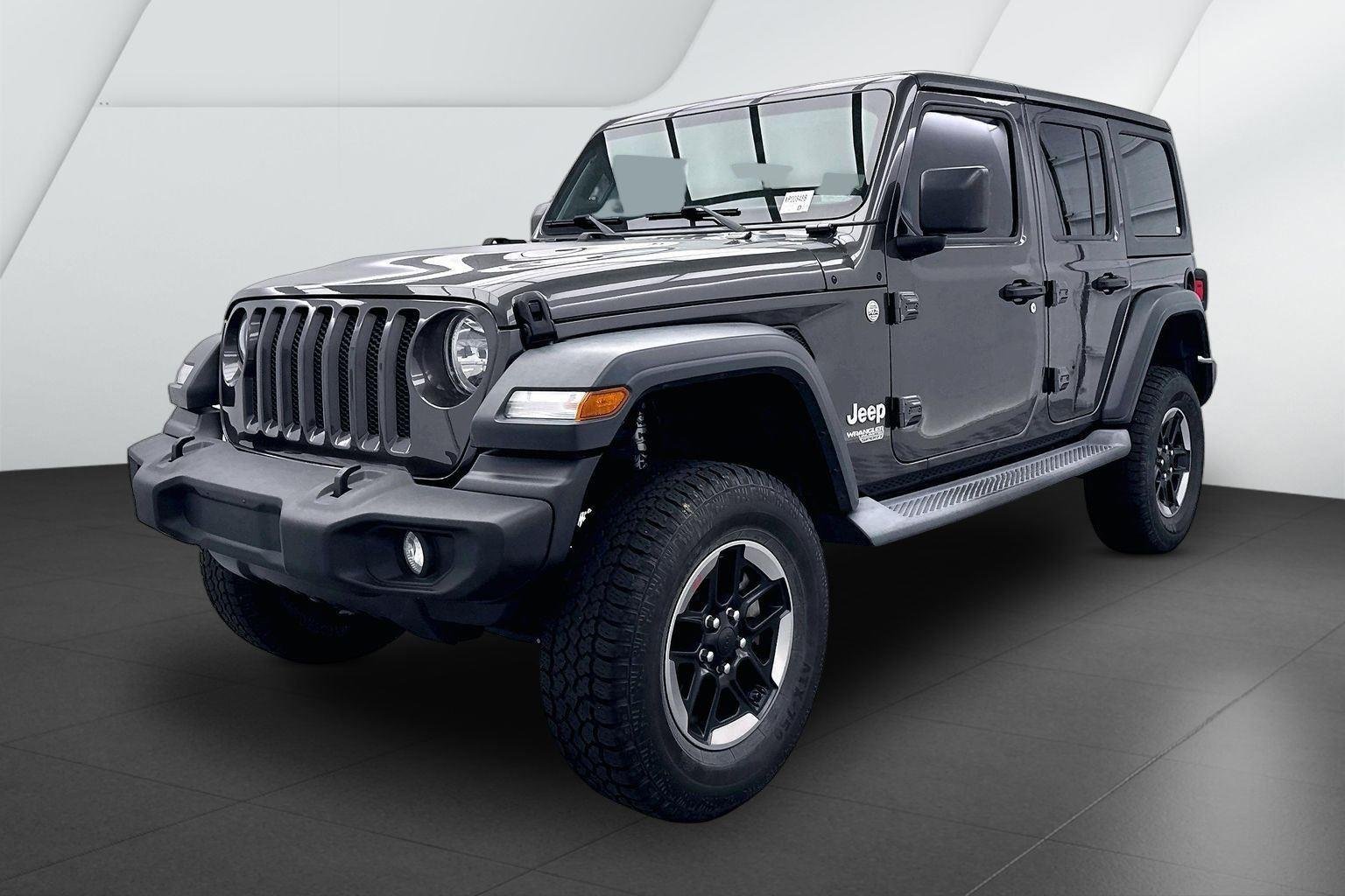 Used 2018 Granite Crystal Metallic Clearcoat Jeep Sport image 3