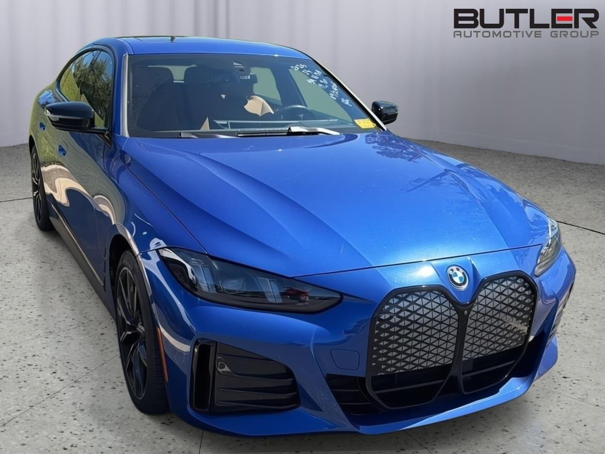 Used 2025 Portimao Blue Metallic BMW eDrive40 image 5