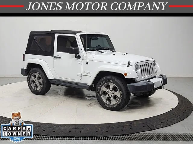 Used 2016 White Jeep Sahara image 1