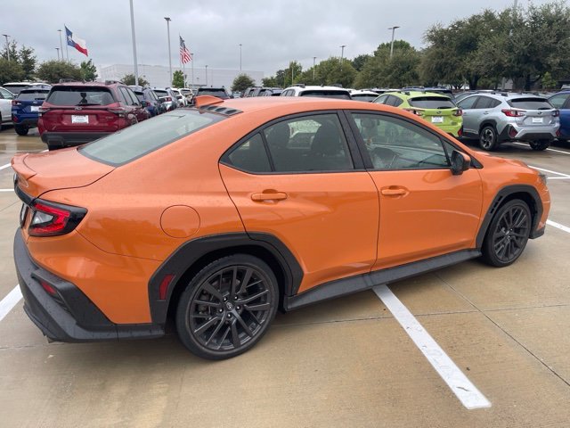 Used 2023 Solar Orange Pearl Subaru Premium image 3