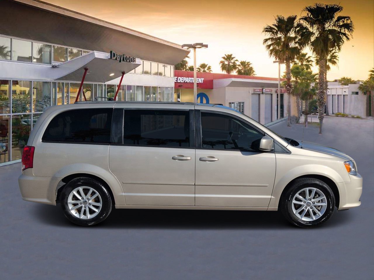 Used 2014 Dodge Grand Caravan SXT with VIN 2C4RDGCG0ER428953 for sale in Daytona Beach, FL
