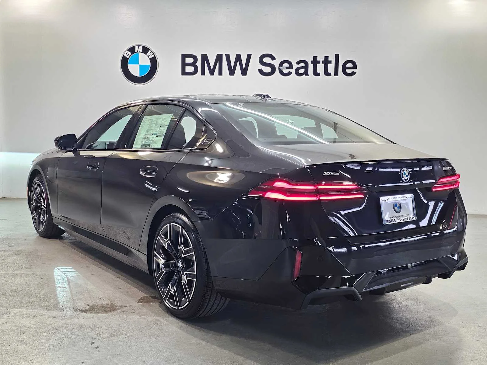 New 2027 Black Sapphire Metallic BMW xDrive image 4