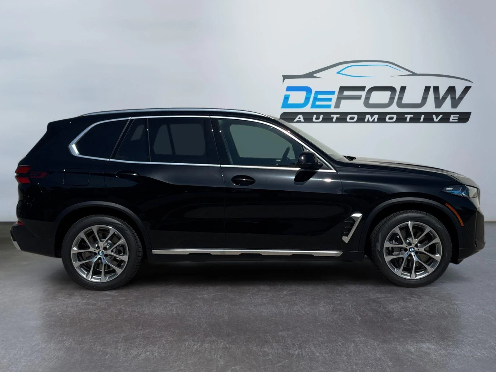 New 2026 Black Sapphire Metallic BMW xDrive50e image 2