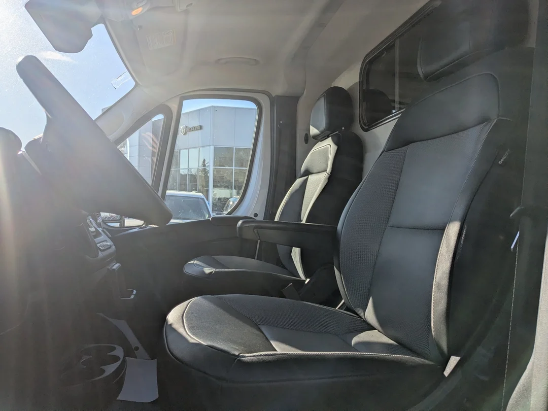 Certified Used 2025 White RAM Tradesman - - FWD - C/V HR 136 WB - Convenience Grp - Cargo Partition - Wall Paneling & More! image 13