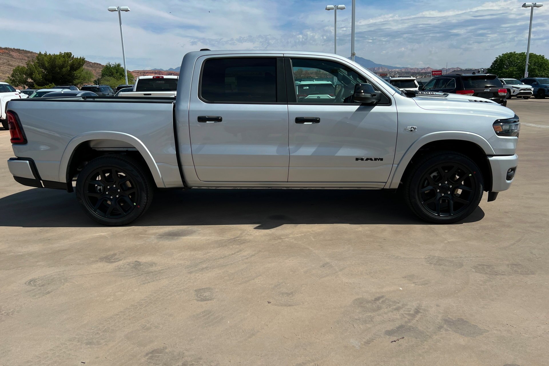 New 2026 Silver Zynith Exterior Paint RAM Laramie image 7