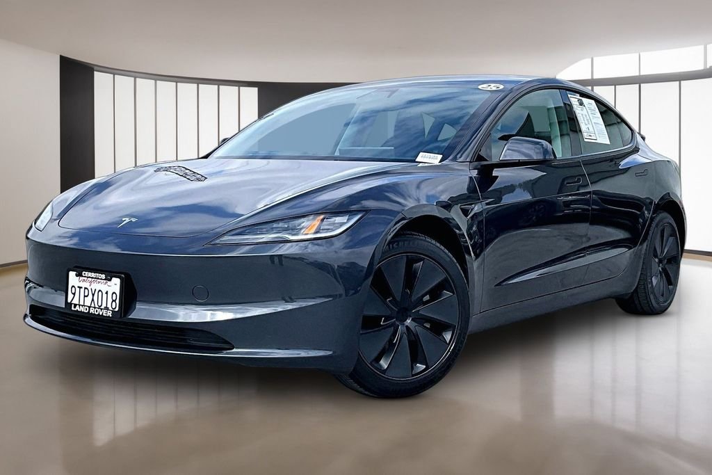 Used 2025 Stealth Gray Tesla Long Range image 1