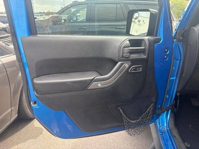 Used 2015 Blue Jeep Unlimited Sport image 11