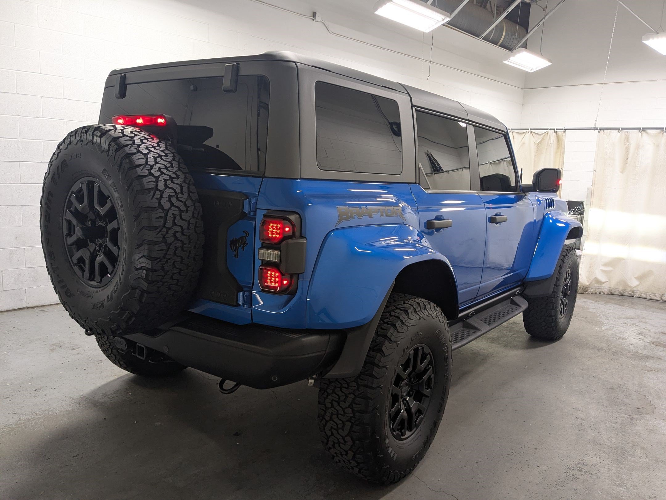 Used 2024 Blue Metallic Ford Raptor image 4