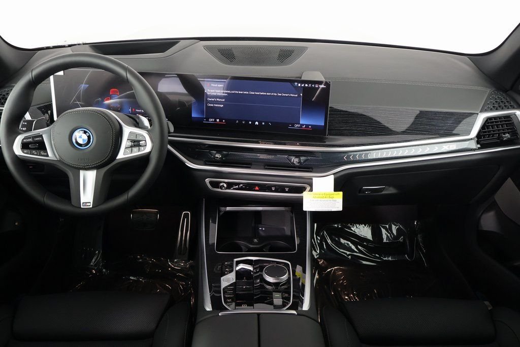 New 2026 Black Sapphire Metallic BMW xDrive50e image 4