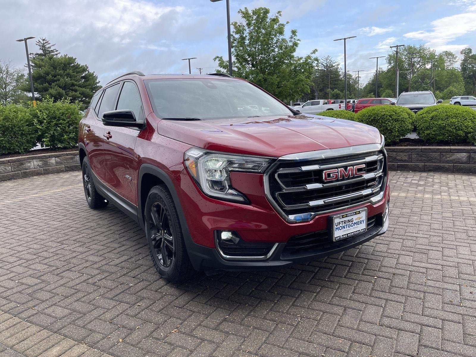 Used 2024 Volcanic Red Tintcoat GMC AT4 image 7
