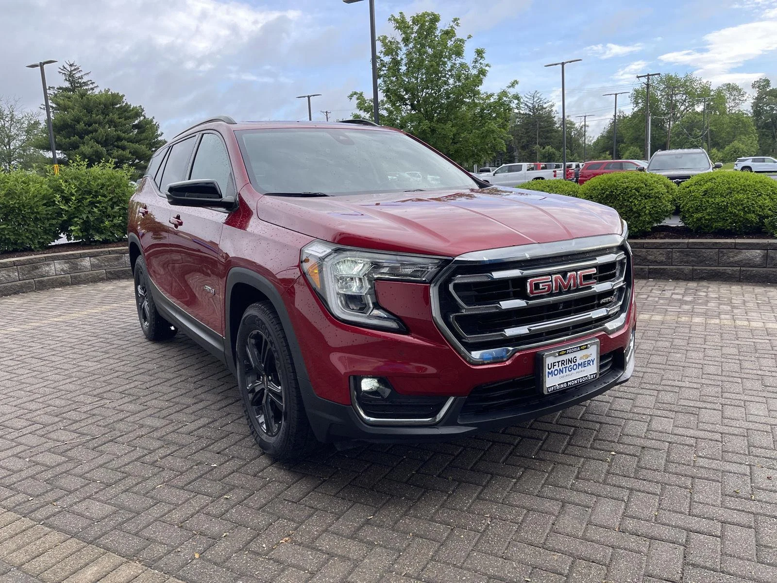 Used 2024 Volcanic Red Tintcoat GMC AT4 image 7