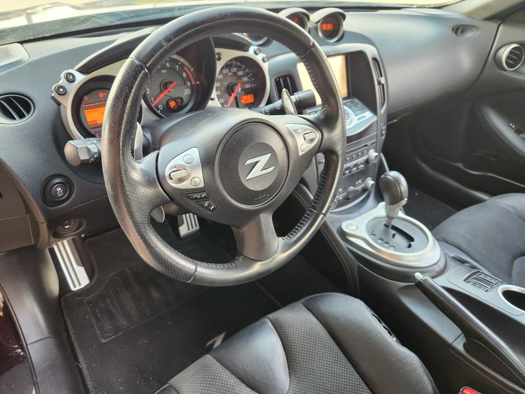 Used 2016 Black Cherry Nissan Touring image 29