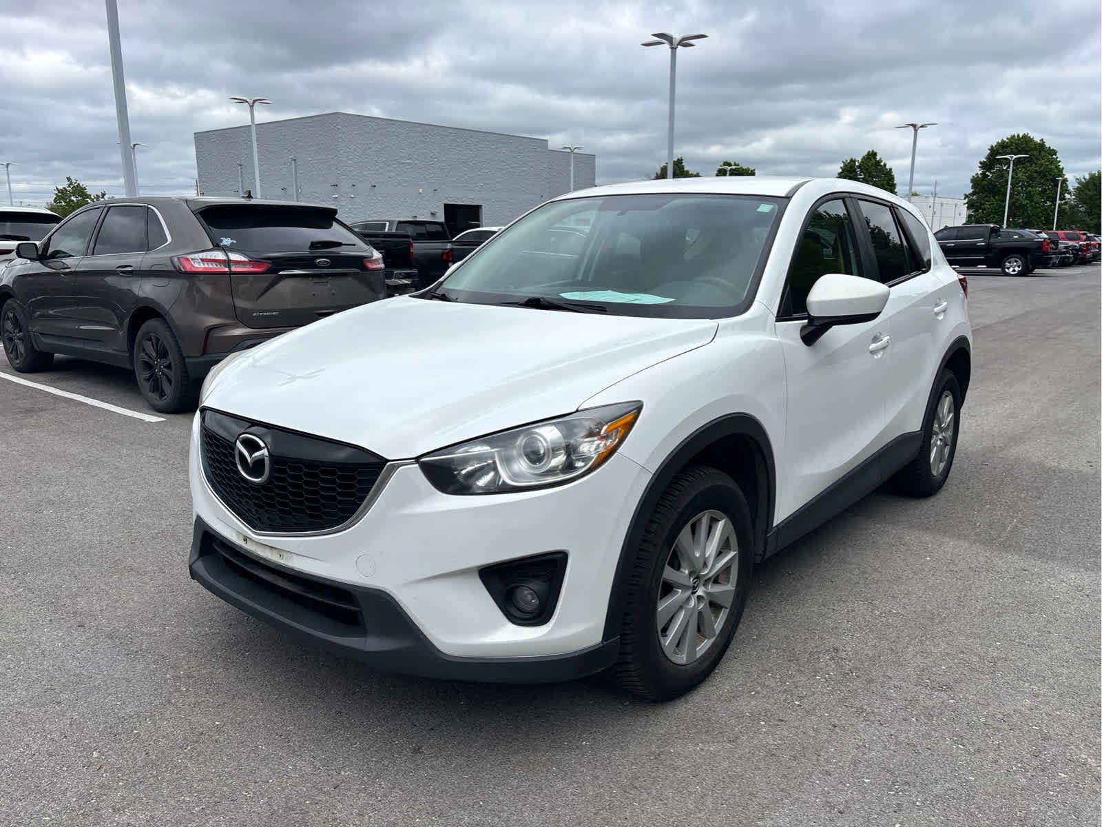 Used 2015 Mazda CX-5 Touring with VIN JM3KE2CY0F0454935 for sale in Kansas City