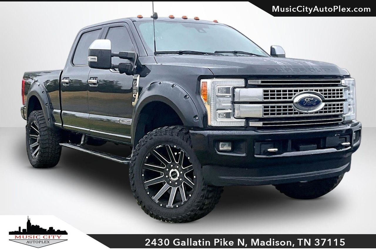 Used 2019 AGATE BLACK Ford Platinum image 1