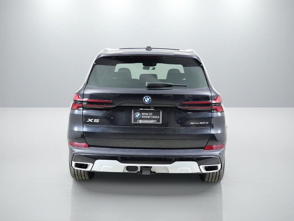 Used 2026 Black Sapphire Metallic BMW xDrive50e image 11