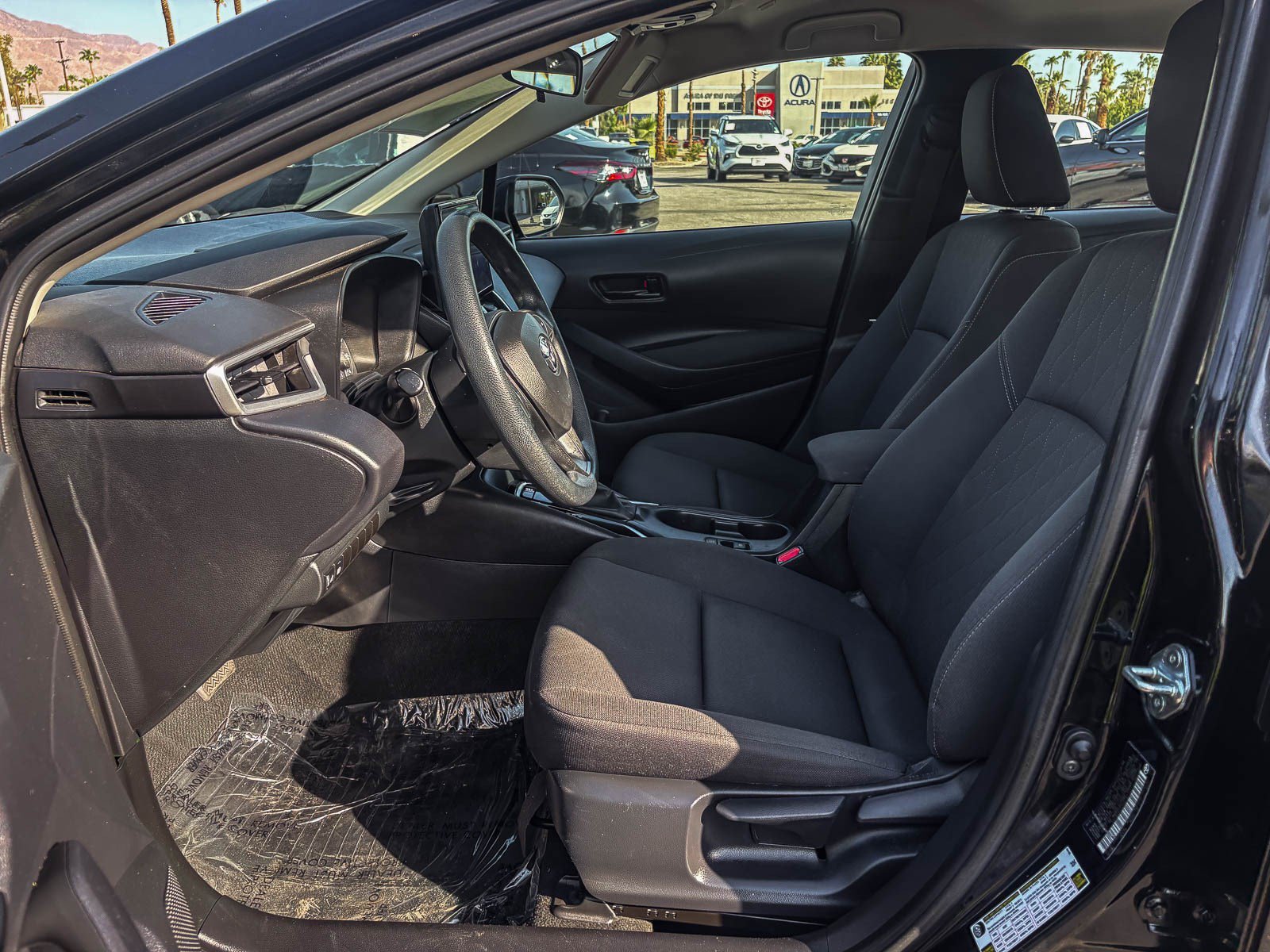 Certified Used 2024 Midnight Black Metallic Toyota LE image 19