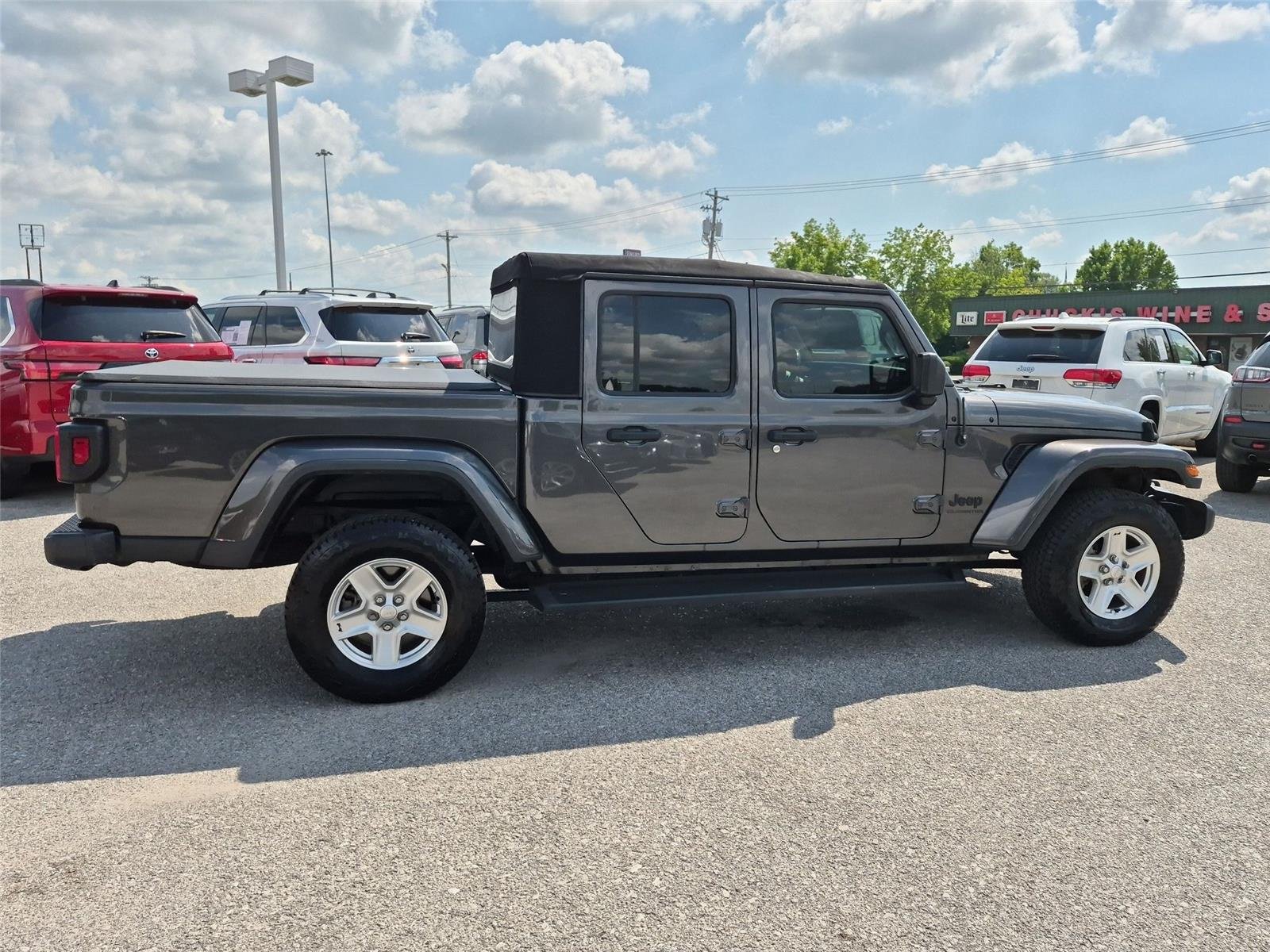 Used 2020 Granite Crystal Metallic Clearcoat Jeep Sport S image 6