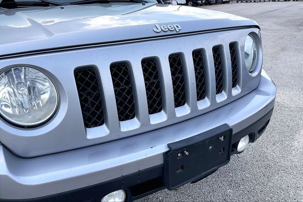 Used 2016 Maximum Steel Metallic Jeep Sport image 32