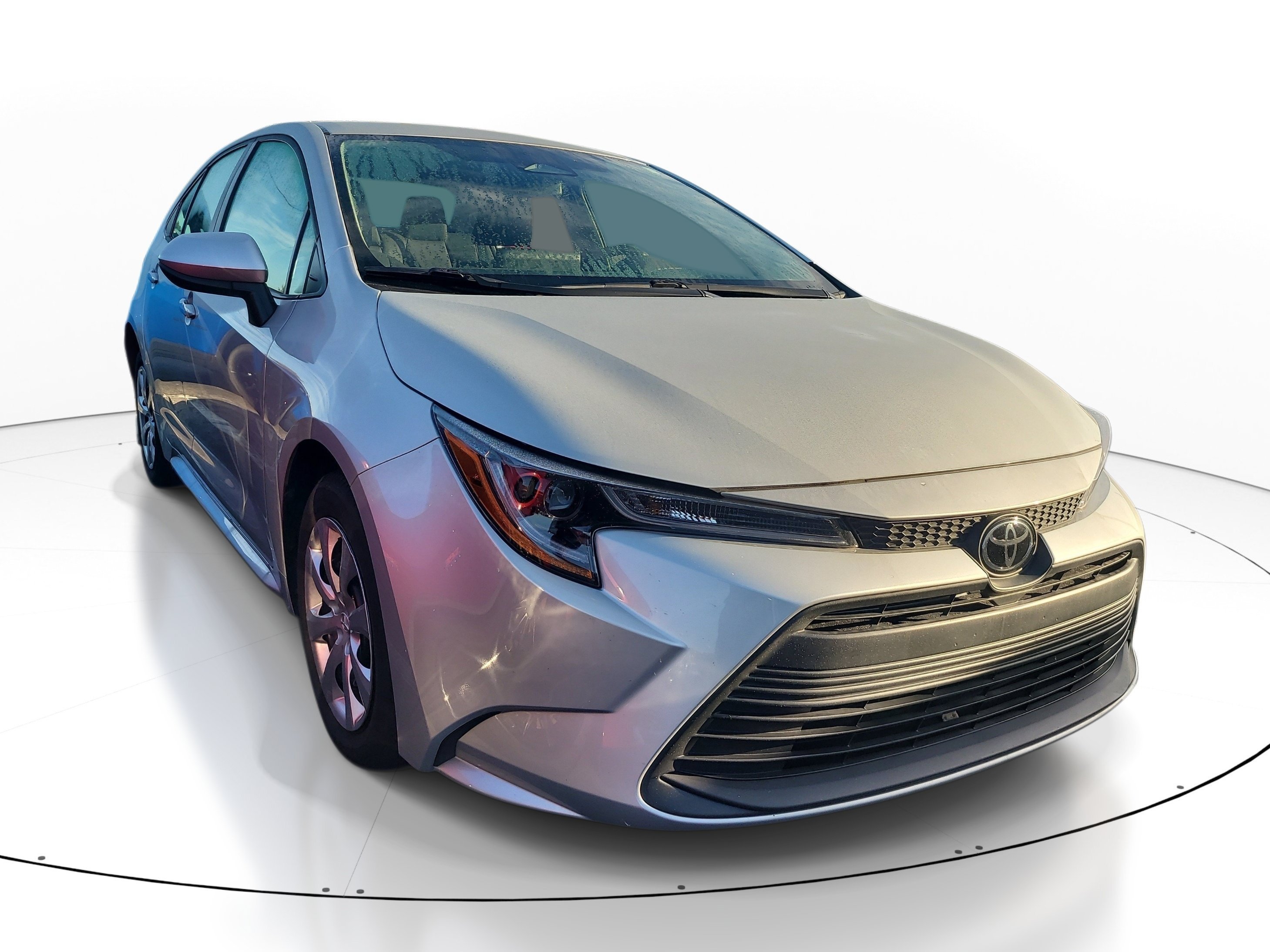Used 2025 Classic Silver Metallic Toyota LE image 1
