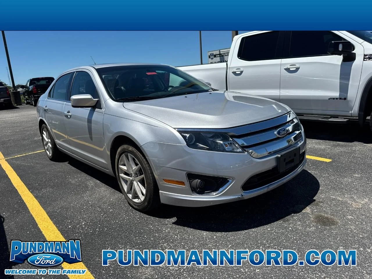 Used 2012 Ingot Silver Metallic Ford 4dr Sdn SEL FWD image 1