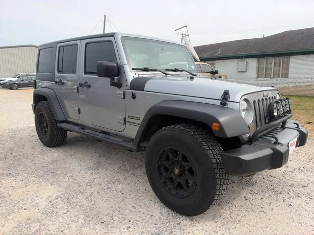 Used 2016 Silver Jeep Unlimited Sport image 2