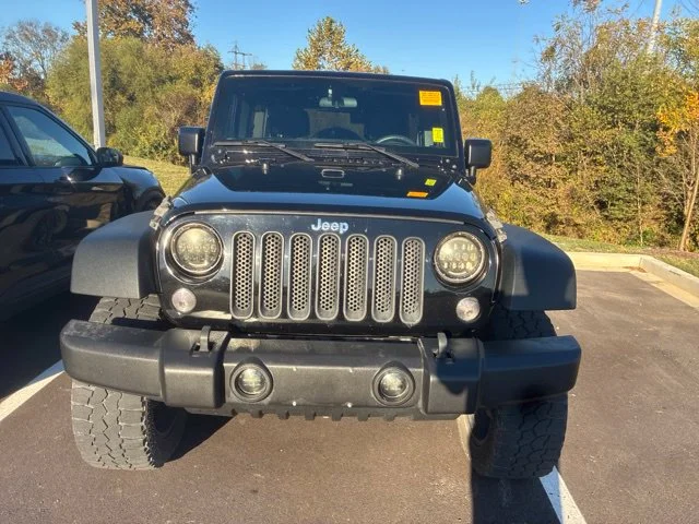 Used 2015 Black Jeep Unlimited Sport image 2