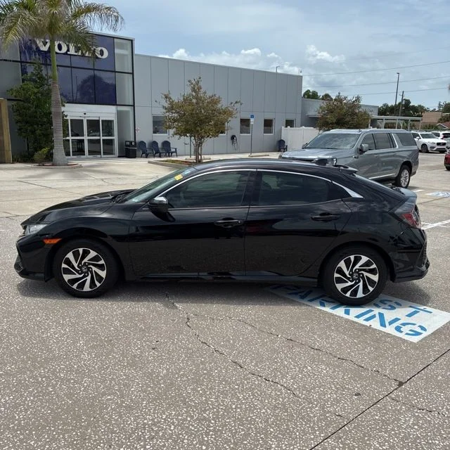 Used 2018 Crystal Black Pearl Honda LX image 1
