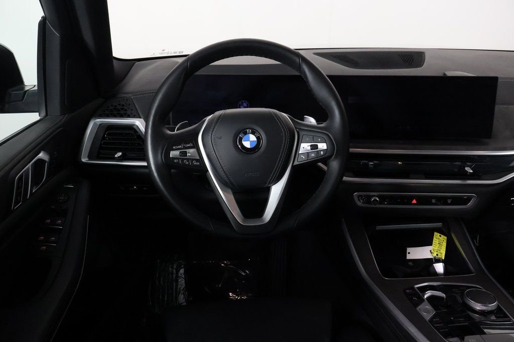 Certified Used 2024 Black Sapphire Metallic BMW sDrive40i image 8