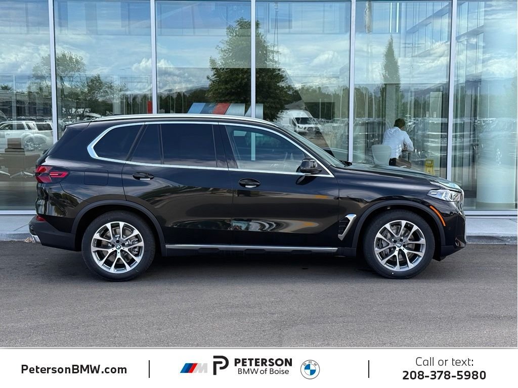 New 2026 Black Sapphire Metallic BMW xDrive50e image 6