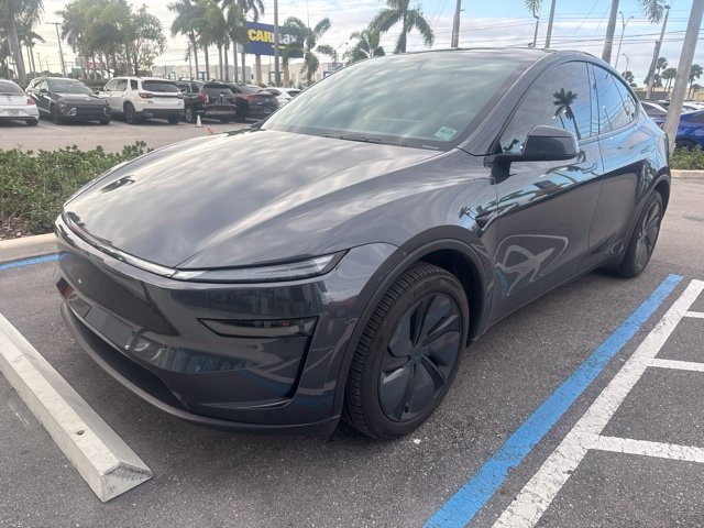 Used 2026 Green Tesla  image 1