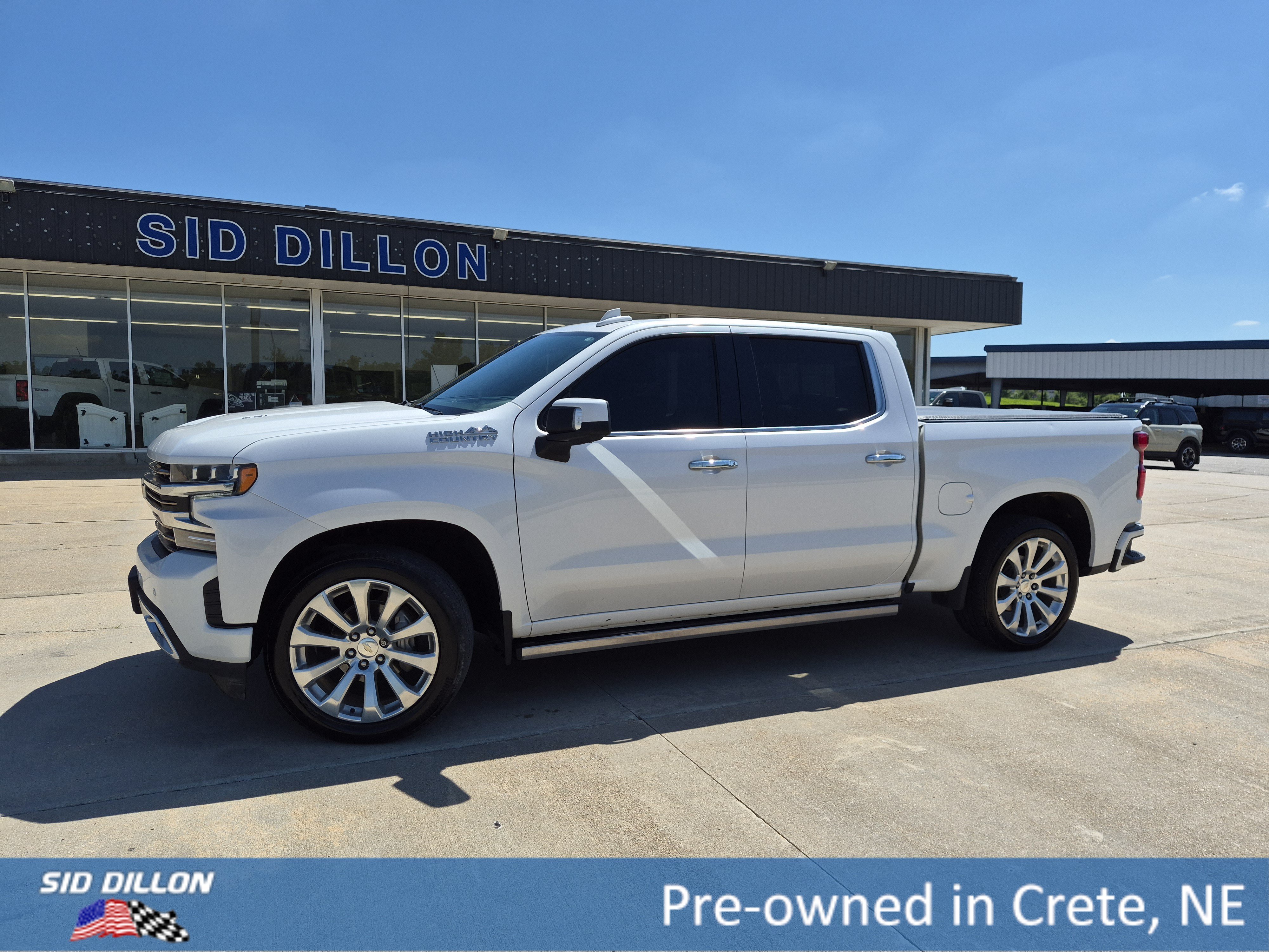 Used 2021 Iridescent Pearl Tricoat Chevrolet High Country image 1