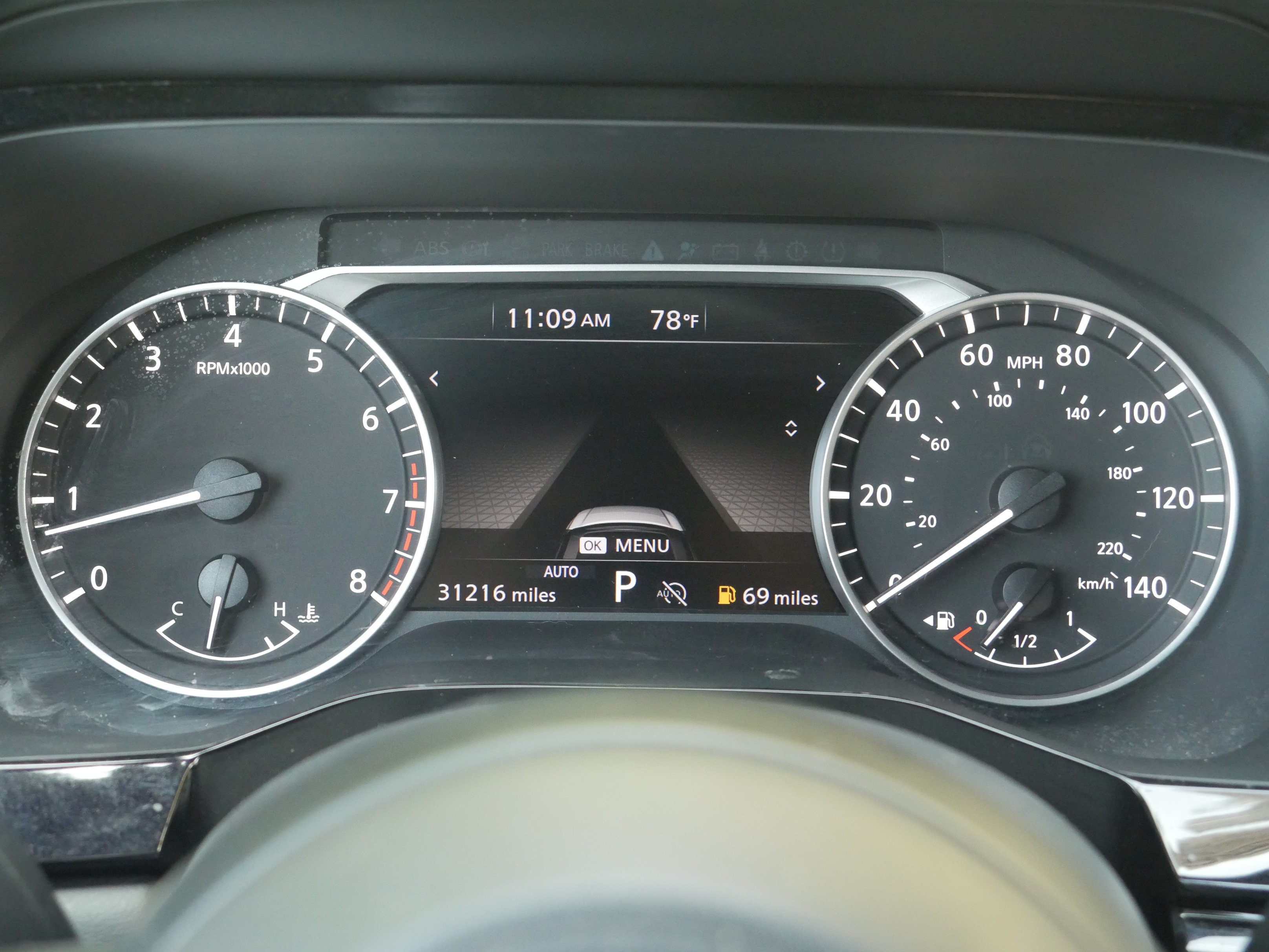 Used 2024 Solid Gray/Super Black Nissan Rock Creek image 7