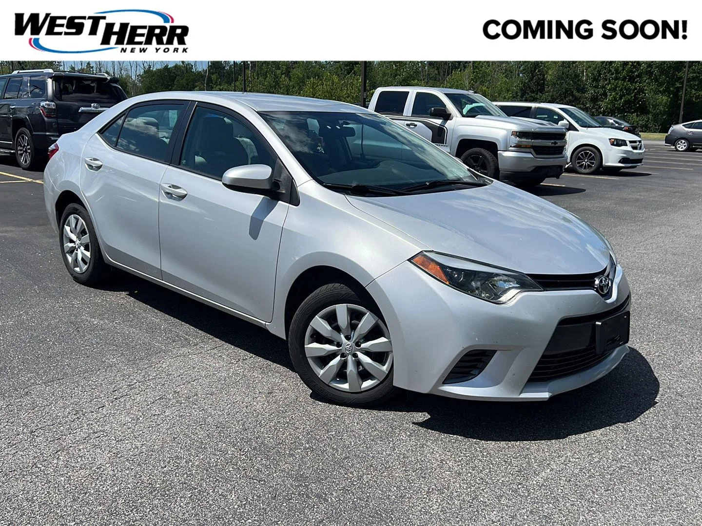 Used 2016 Classic Silver Metallic Toyota LE image 1