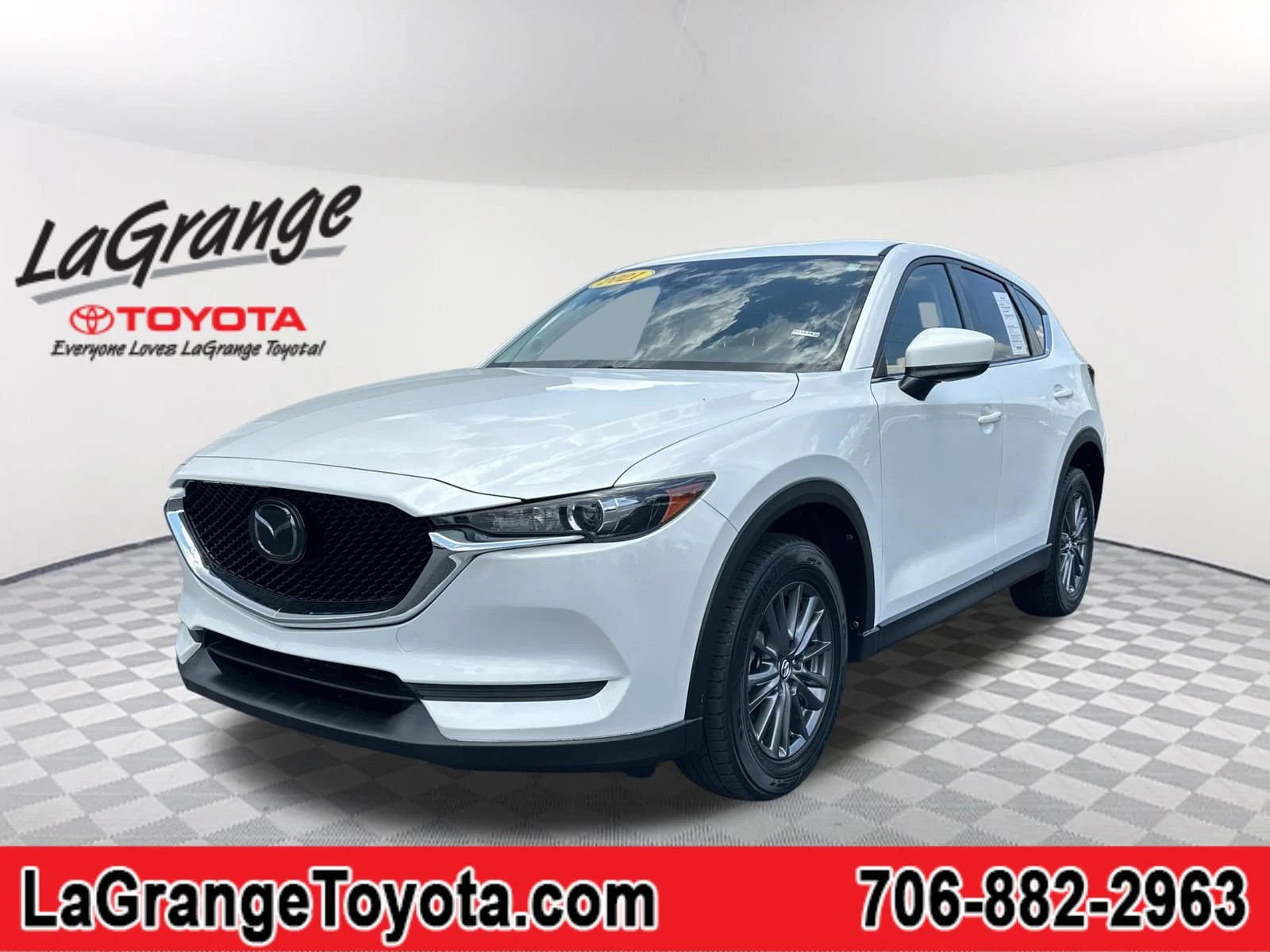 Used 2021 Snowflake White Pearl Mica Mazda Touring image 1