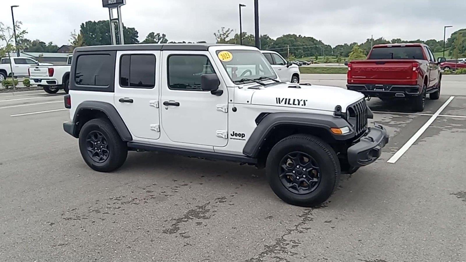 Used 2023 Jeep Wrangler 4-Door Willys with VIN 1C4HJXDN0PW695537 for sale in Kansas City