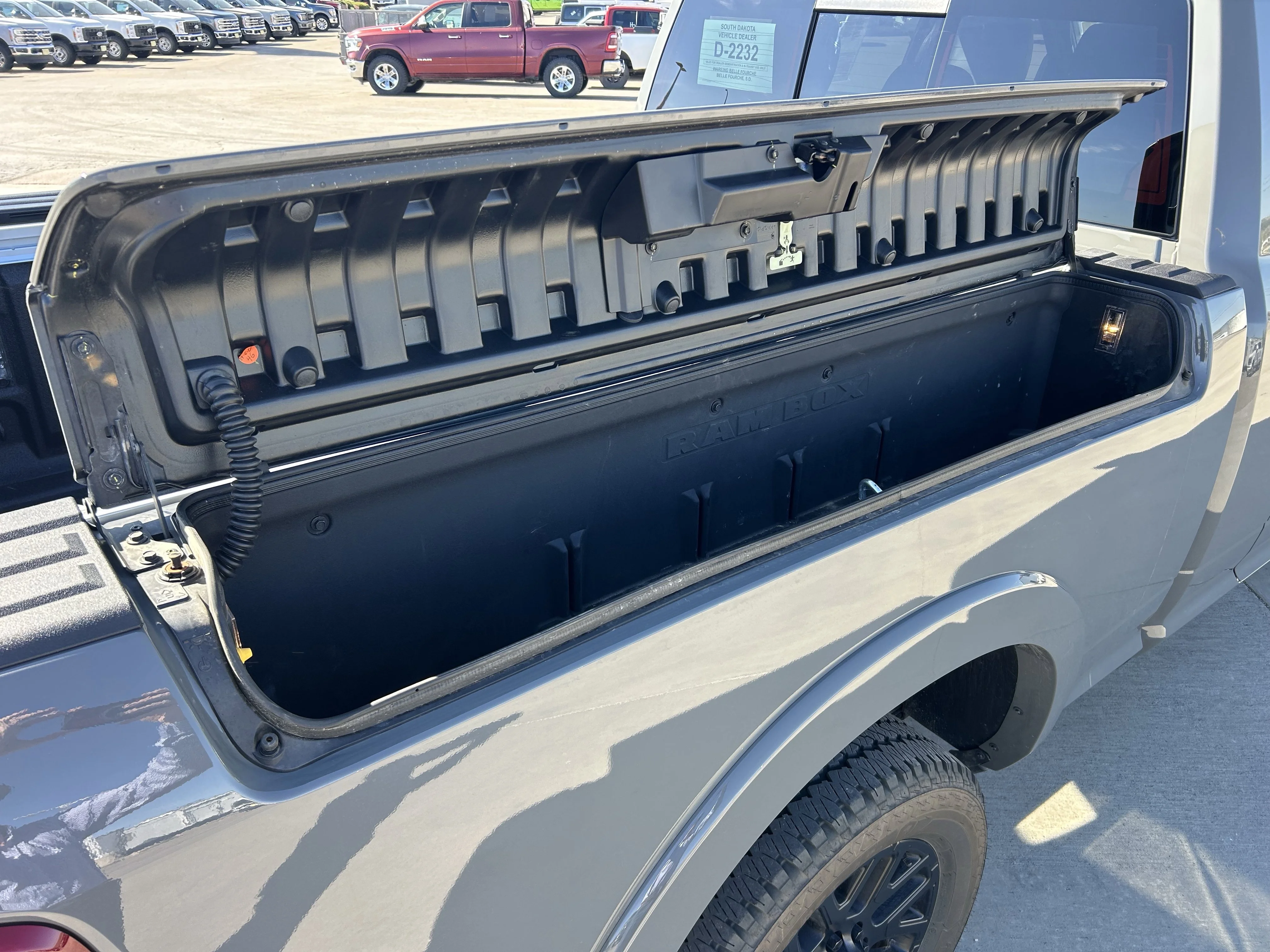Used 2025 Ceramic Gray Clearcoat Ram Limited image 6