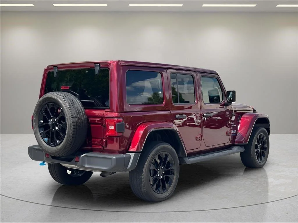 Used 2022 Snazzberry Pearlcoat Jeep Unlimited Sahara image 5