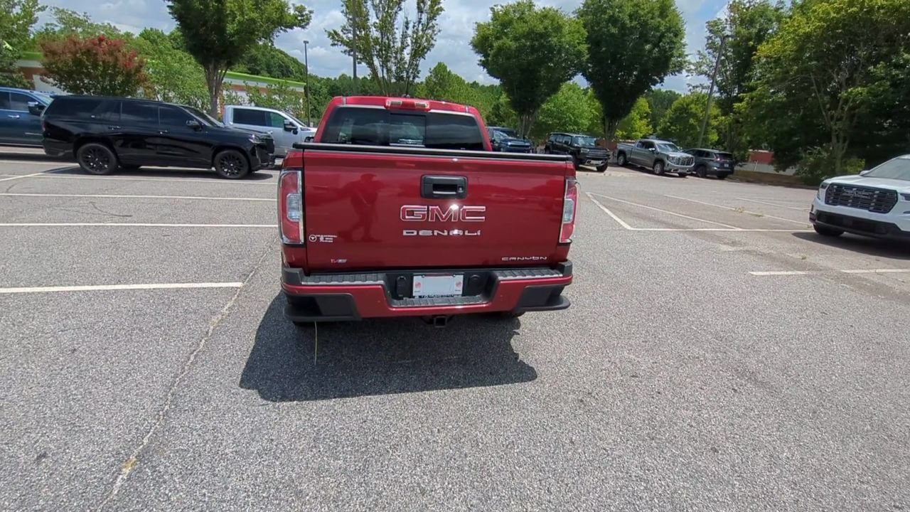 Used 2021 CAYENNE RED TINTCOAT GMC 2WD Denali image 7