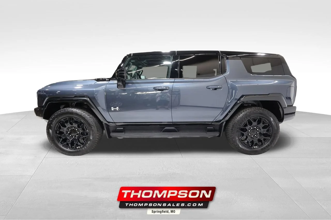 Used 2026 Graphite Blue Metallic GMC 2X image 1