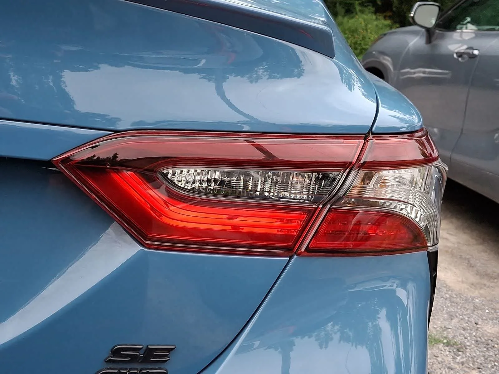 Used 2024 Cavalry Blue Toyota SE image 6