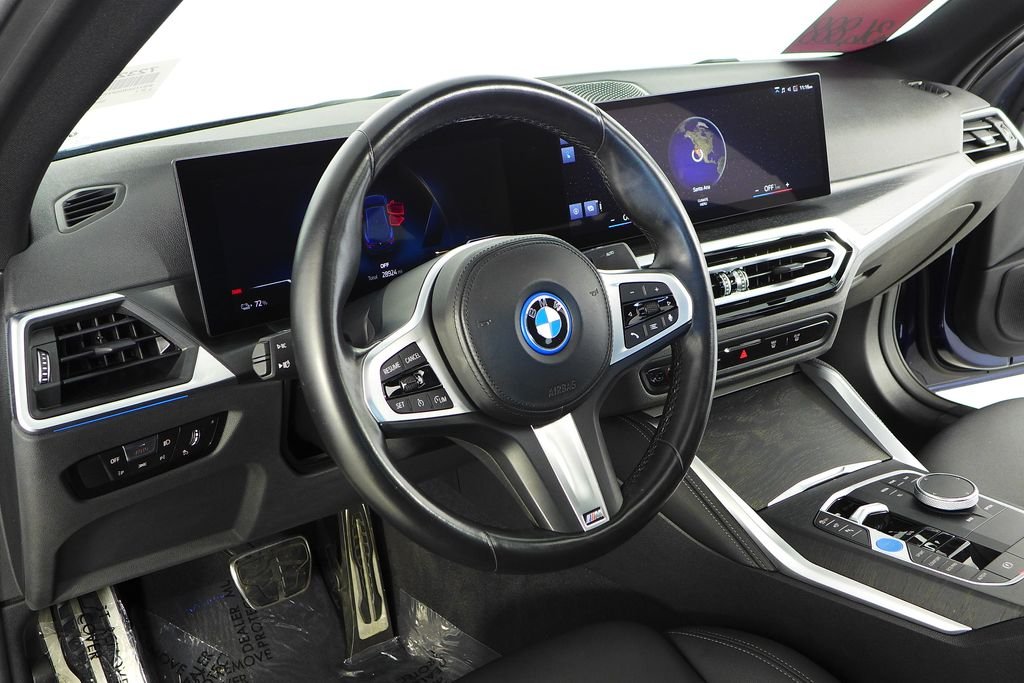 Certified Used 2023 Tanzanite Blue II Metallic BMW eDrive40 image 28