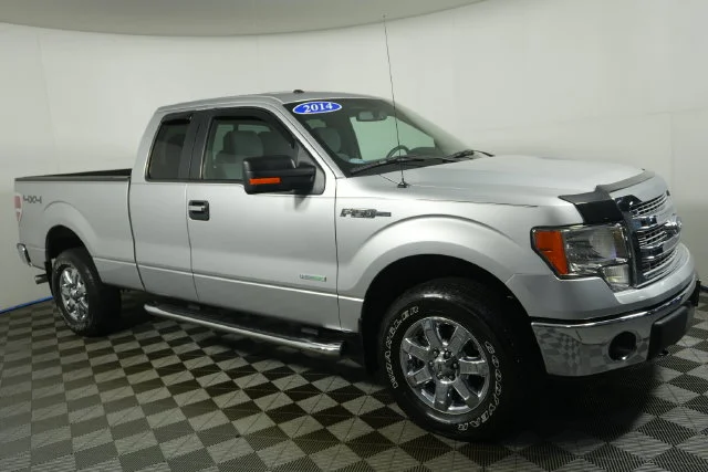 Used 2014 Ingot Silver Metallic Ford XLT image 1