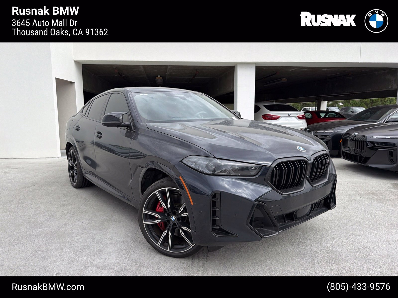 Certified Used 2025 Carbon Black Metallic BMW M60i image 1