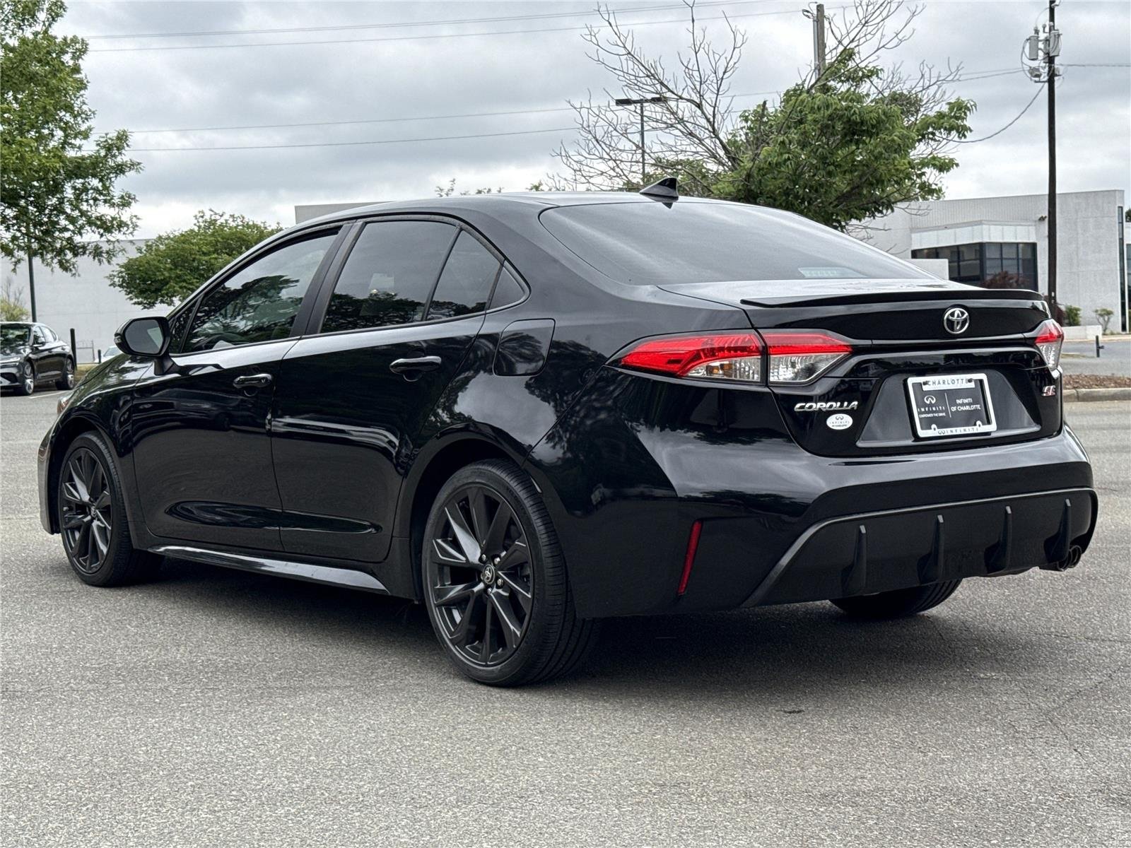 Used 2023 Midnight Black Metallic Toyota SE image 22