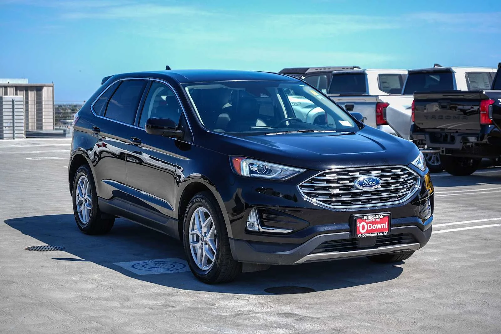 Used 2021 Agate Black Metallic Ford SEL image 4