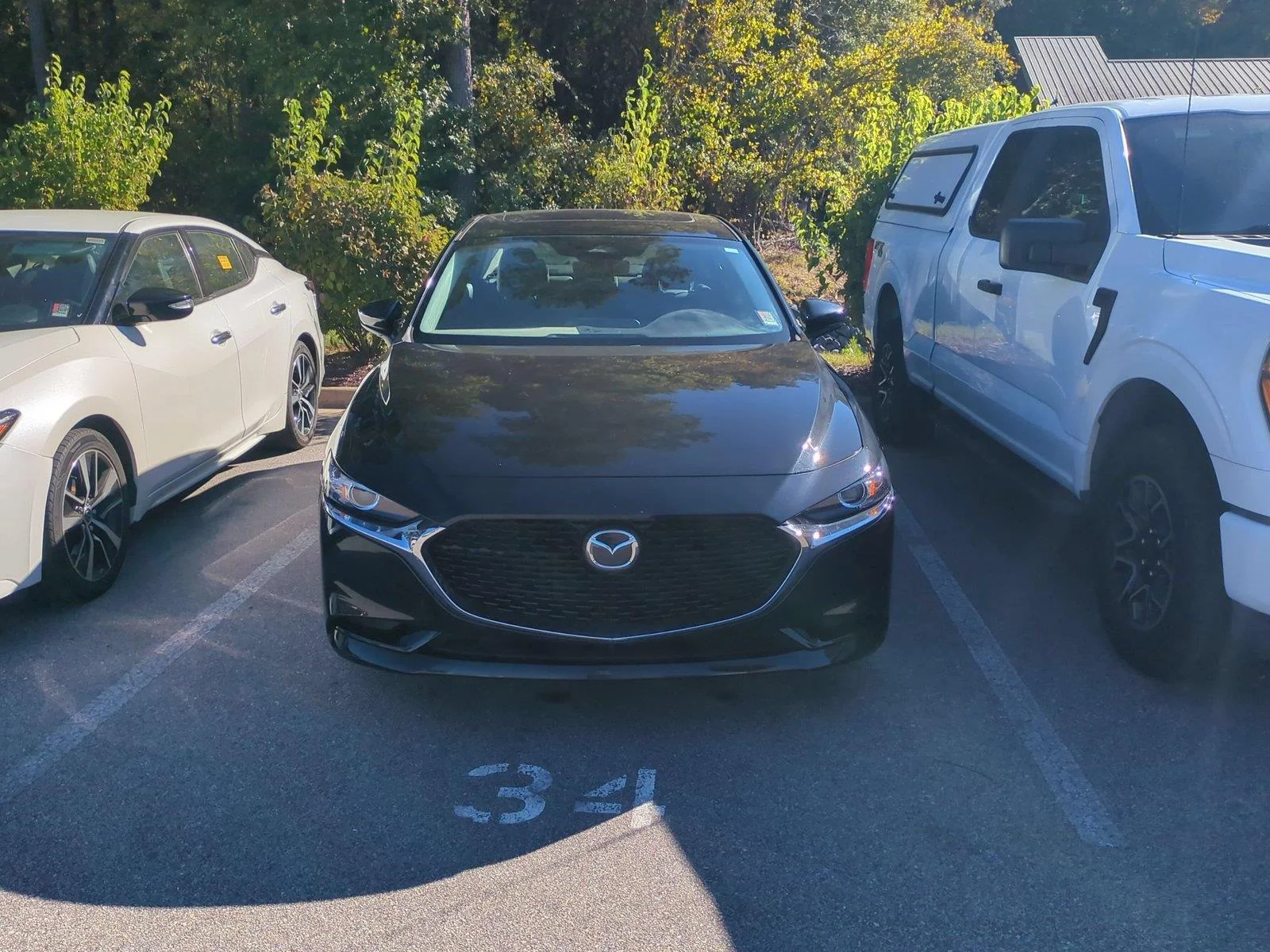 Used 2024 JET BLACK MICA MAZDA PREF image 2