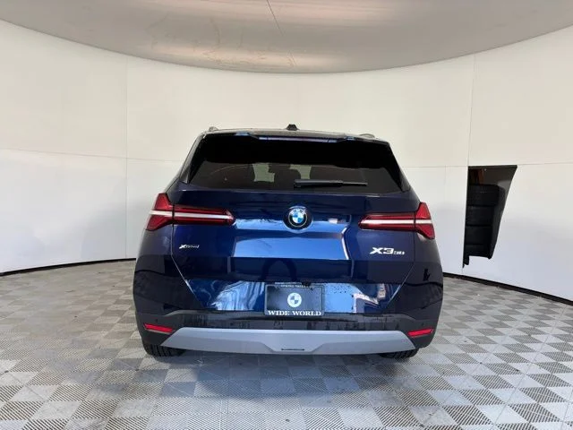 Used 2026 Tanzanite Blue II Metallic BMW 30 xDrive image 6