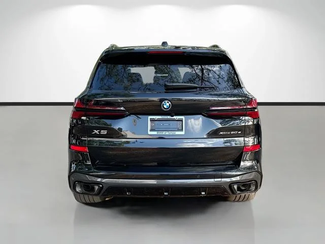 New 2026 Black Sapphire Metallic BMW xDrive50e image 4