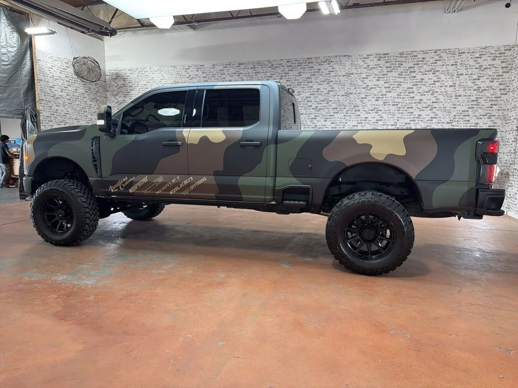 Used 2023 White Metallic / Camo Wrap Ford Lariat image 4