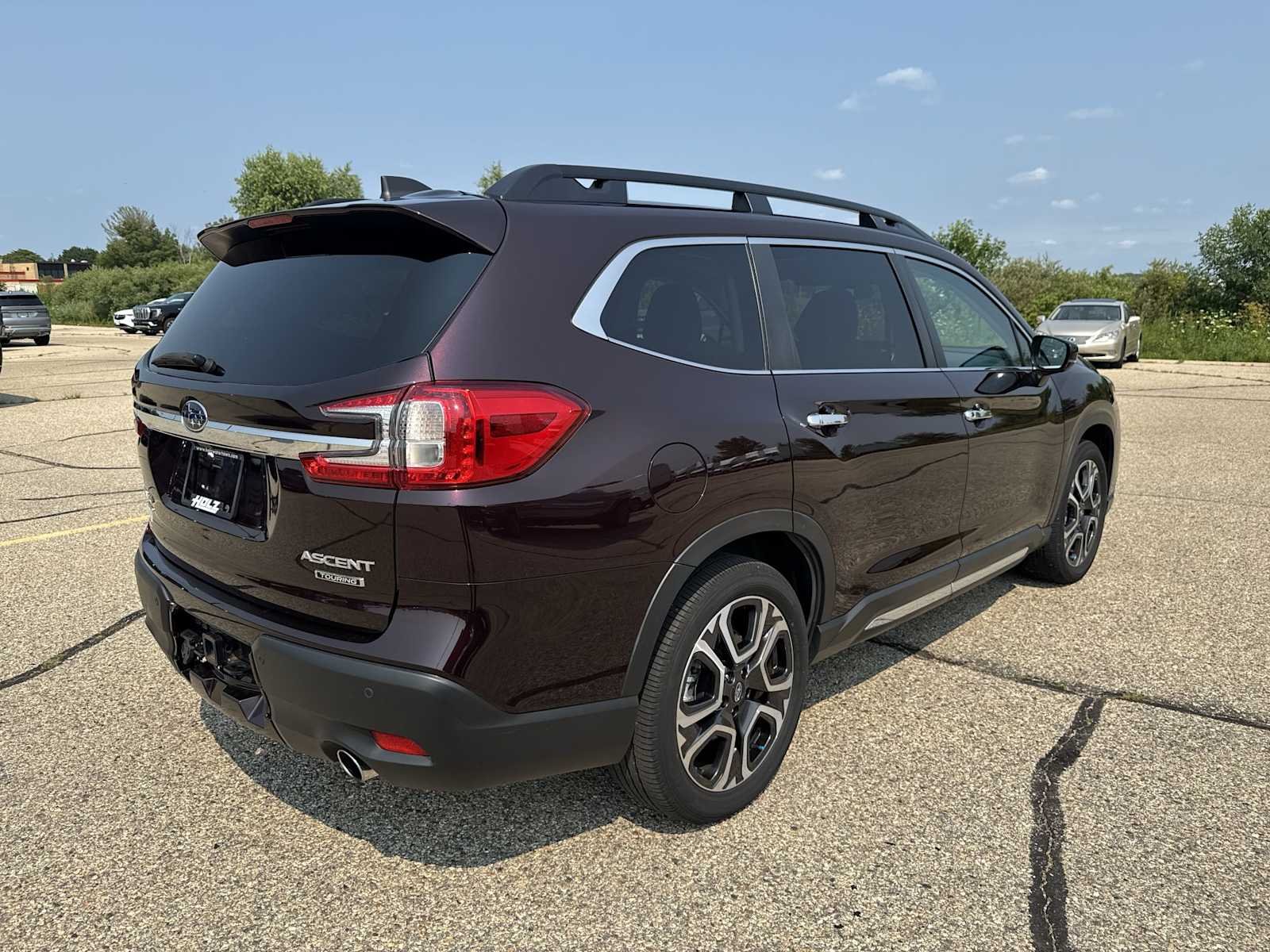 Used 2024 Red Subaru Touring 7-Passenger image 7
